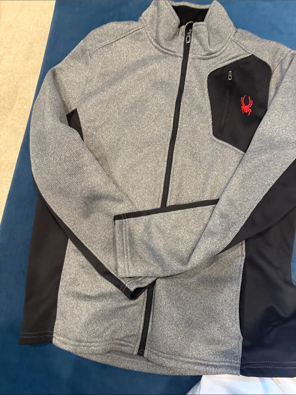 Textured Spyder men’s Gray full zip Jacket with Black Panels and Red Logo